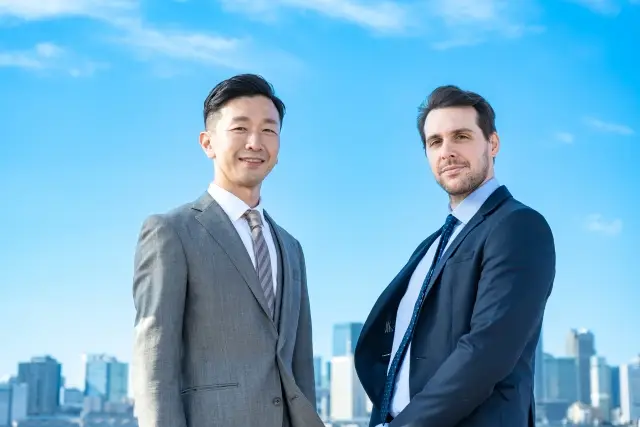 外国人営業マンと日本人営業マン